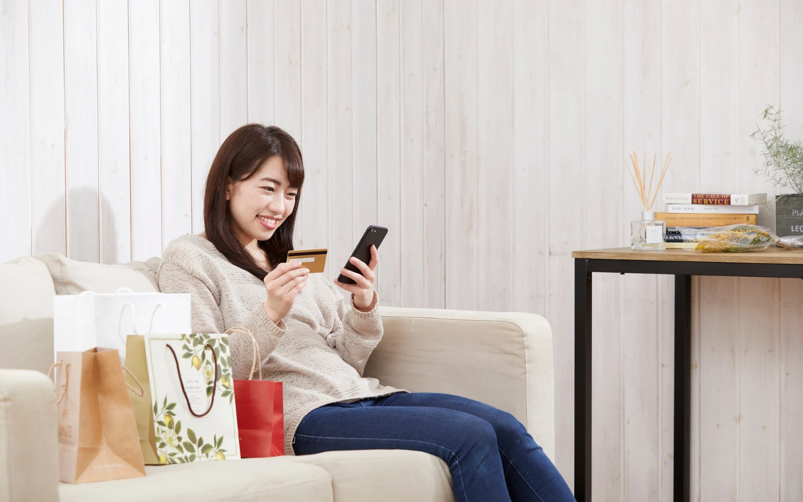 Customer shopping on a mobile phone with a modern website