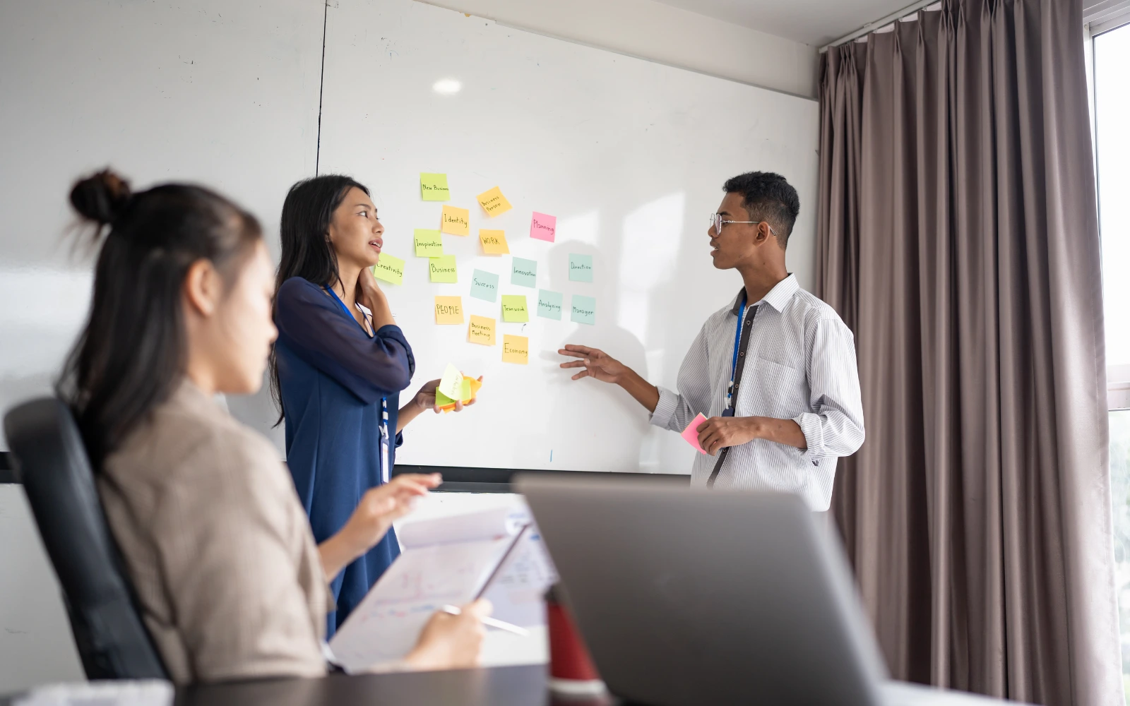 Marketing team collaborating on a social media strategy