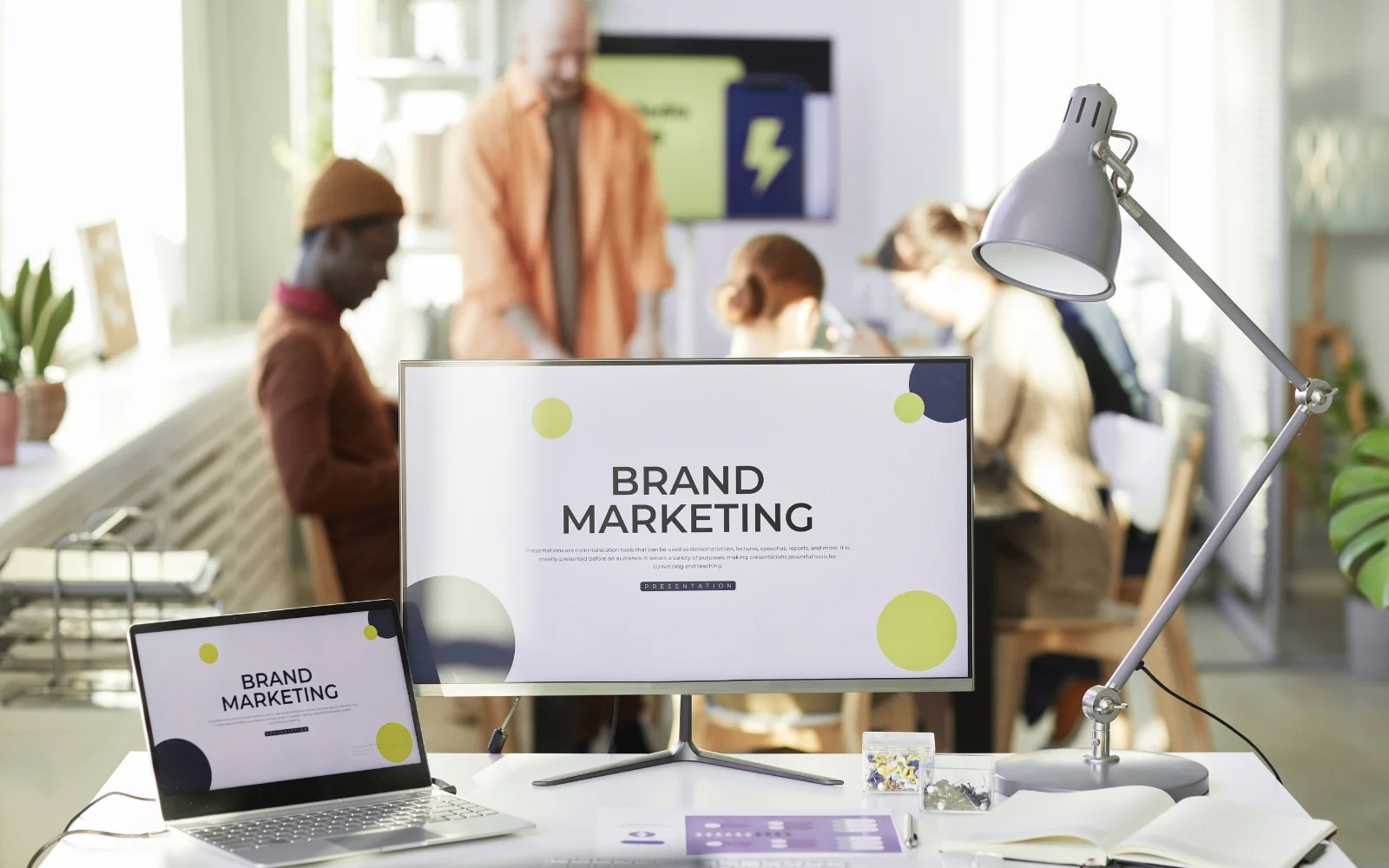 Marketing team planning brand strategy together in modern office
